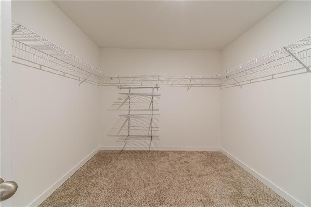 1548 Ridgewood Court Monroe, GA 30656 - Photo 36 of 59 a view of a room with racks on the wall