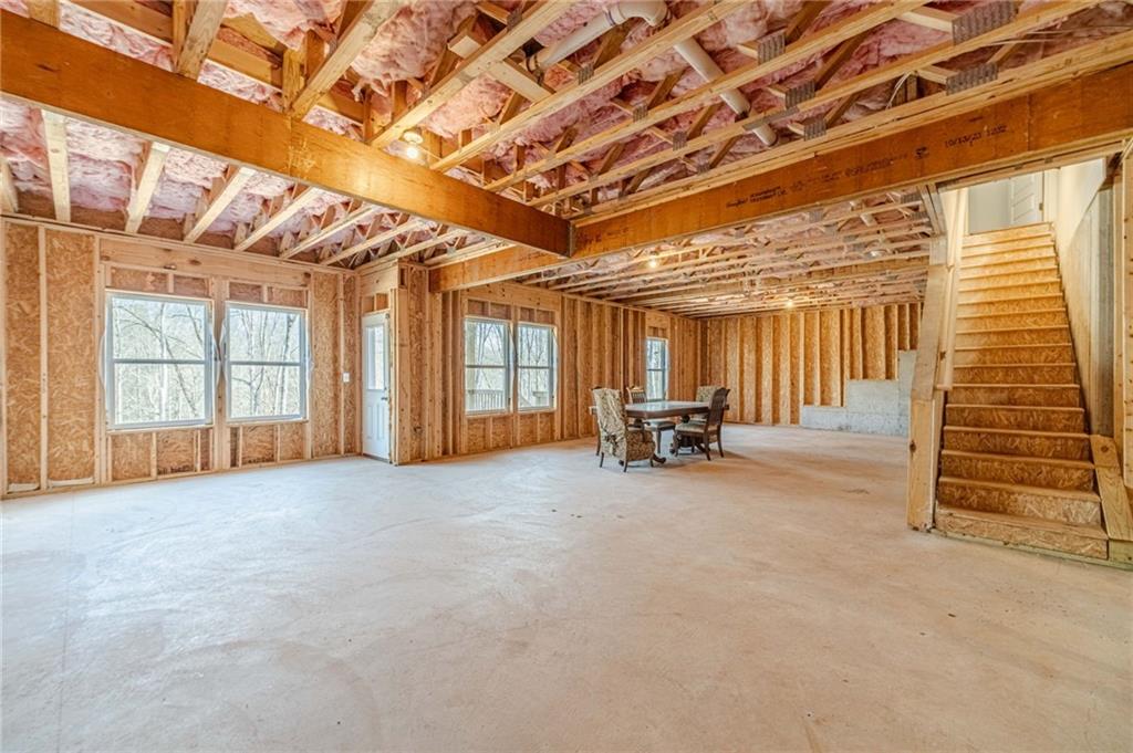 1548 Ridgewood Court Monroe, GA 30656 - Photo 37 of 59 a view of an empty room with windows