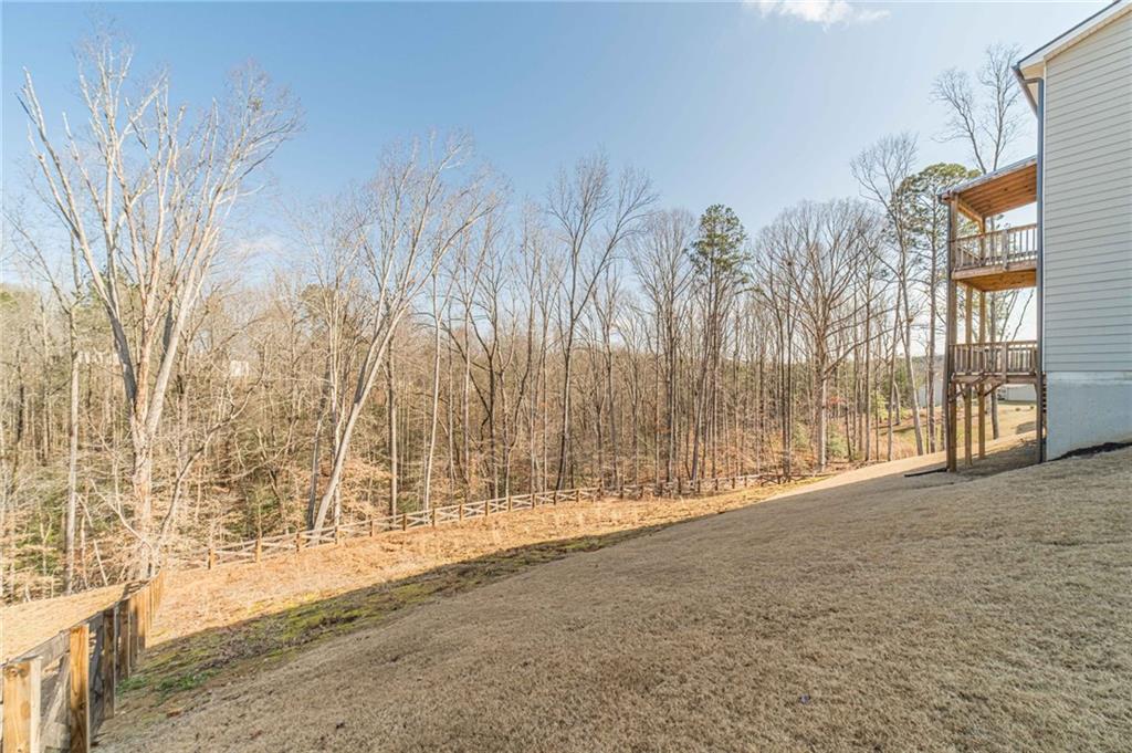 1548 Ridgewood Court Monroe, GA 30656 - Photo 42 of 59 a view of yard with wooden fence