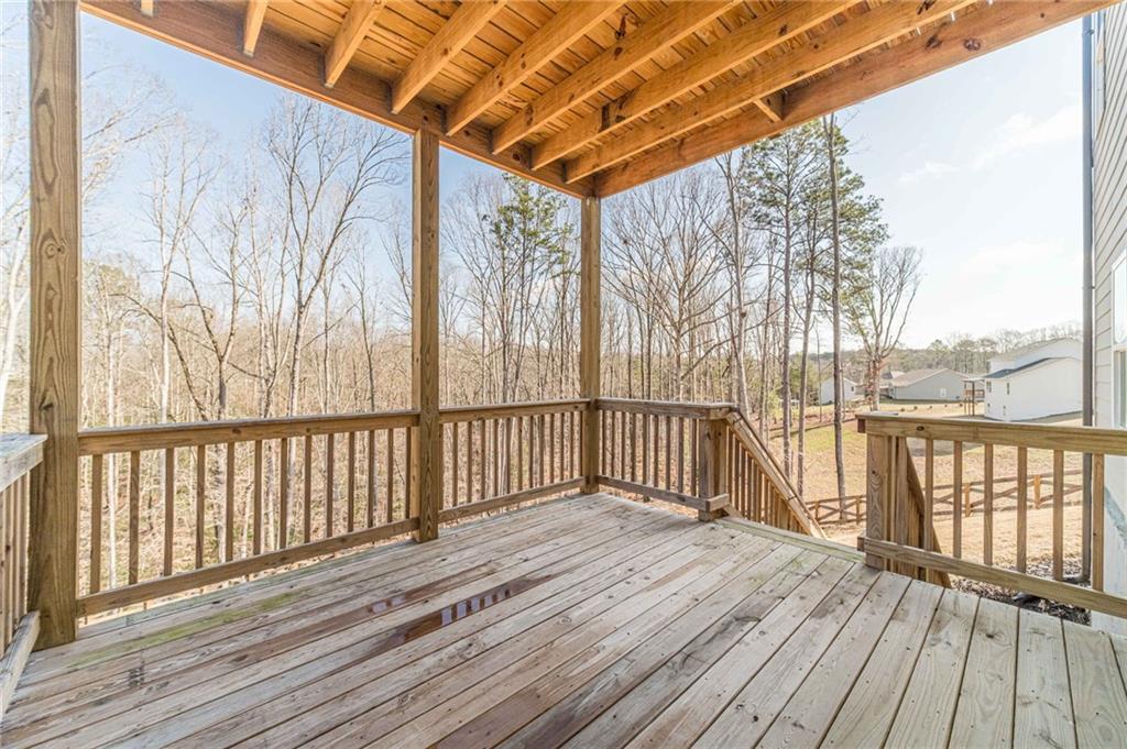 1548 Ridgewood Court Monroe, GA 30656 - Photo 48 of 63 a view of deck with wooden floor and fence