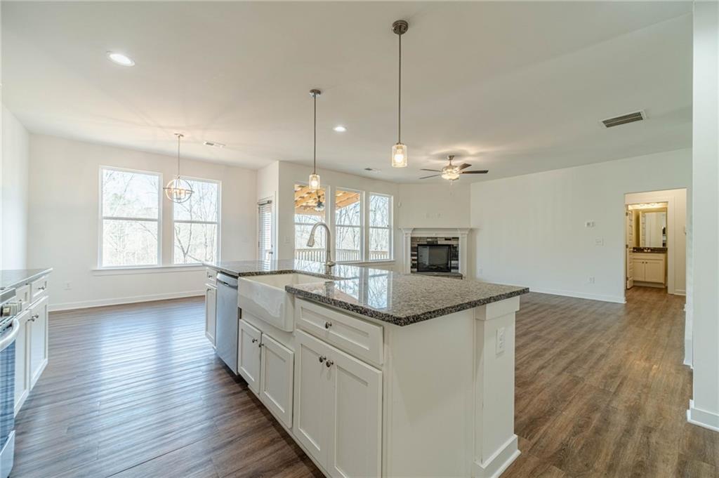 1548 Ridgewood Court Monroe, GA 30656 - Photo 6 of 59 a kitchen with a sink and window