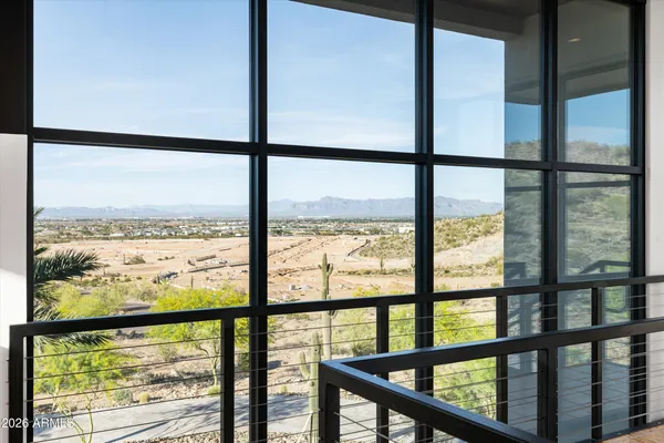 a bathroom with a shower and a sink