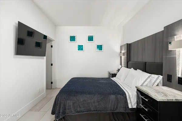 a swimming pool with outdoor seating and yard