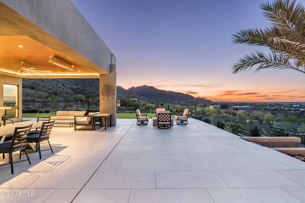 a view of a house with a flat outdoor space