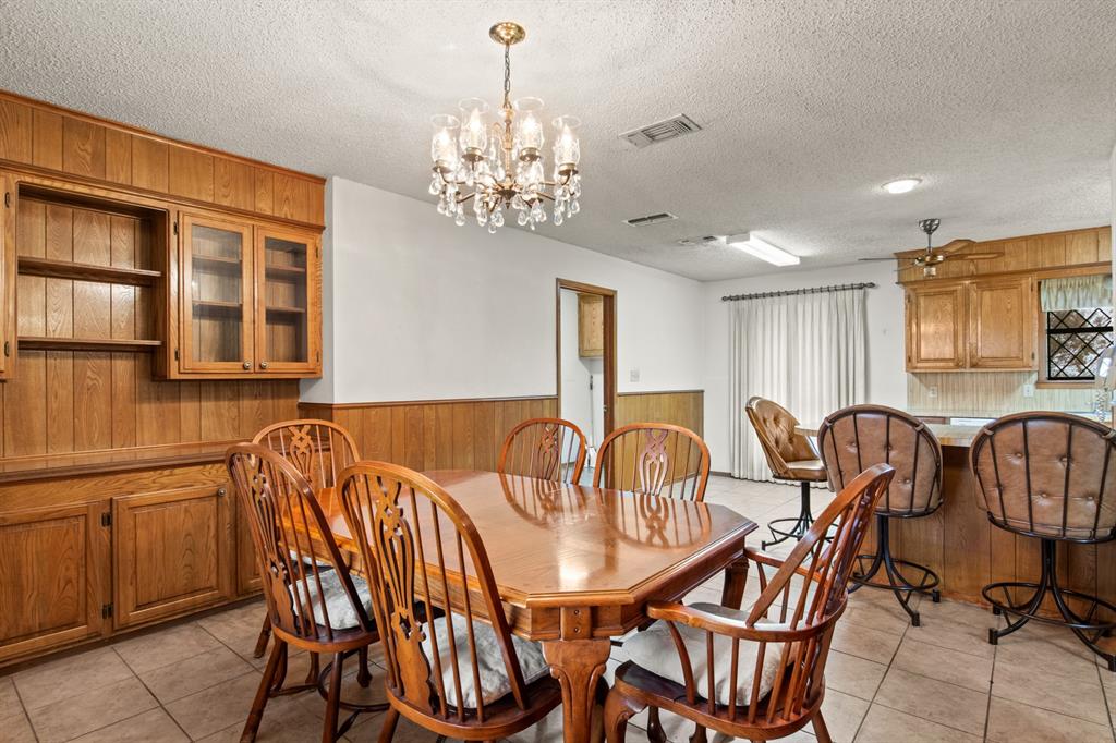 7777 Farm To Market 1001 Cookville, TX 75558 - Photo 13 of 30 a view of a dining room with furniture