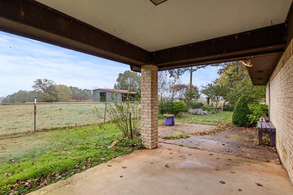 7777 Farm To Market 1001 Cookville, TX 75558 - Photo 24 of 30 a view of a back yard
