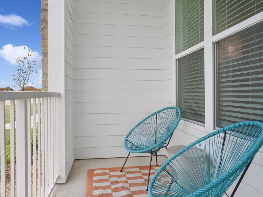 23100 Clay Road, Unit 7203 Katy, TX 77493 - Photo 13 of 29 a view of a balcony with furniture