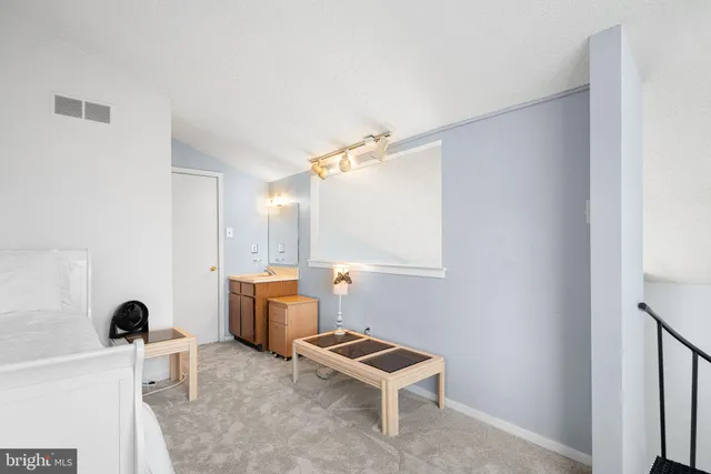 a room with furniture and a window