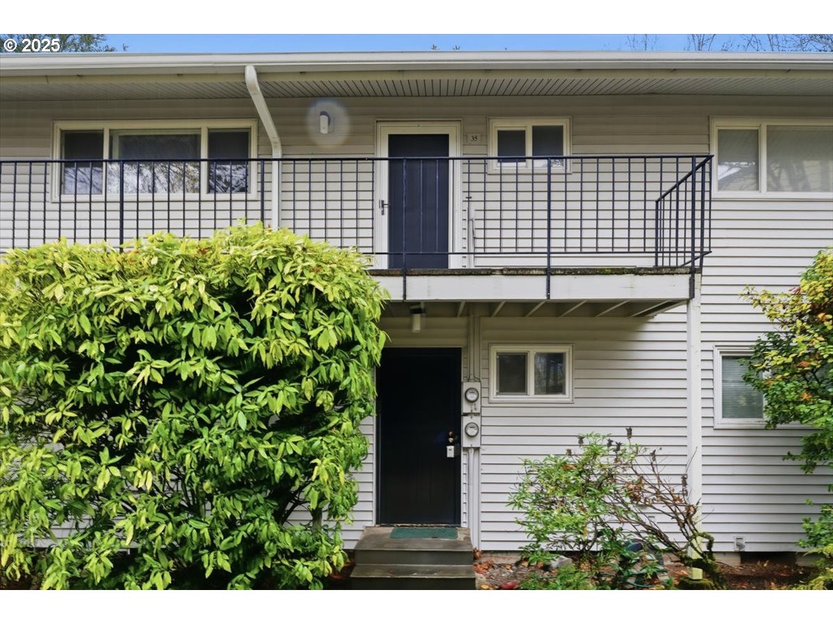 6835 Southwest Capitol Hill Road, Unit 30 Portland, OR 97219 - Photo 2 of 33 a view of a house with windows
