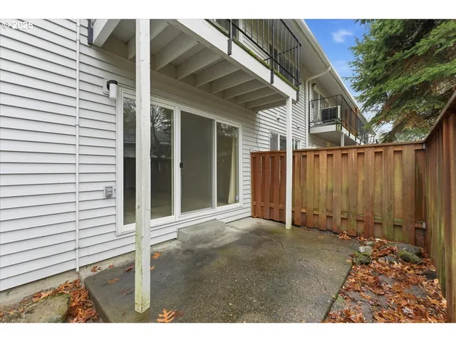 a view of a back yard of the house