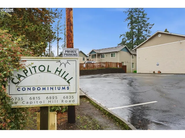 a view of a sign in front of building
