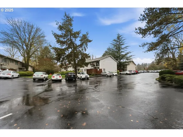 a view of a street with cars