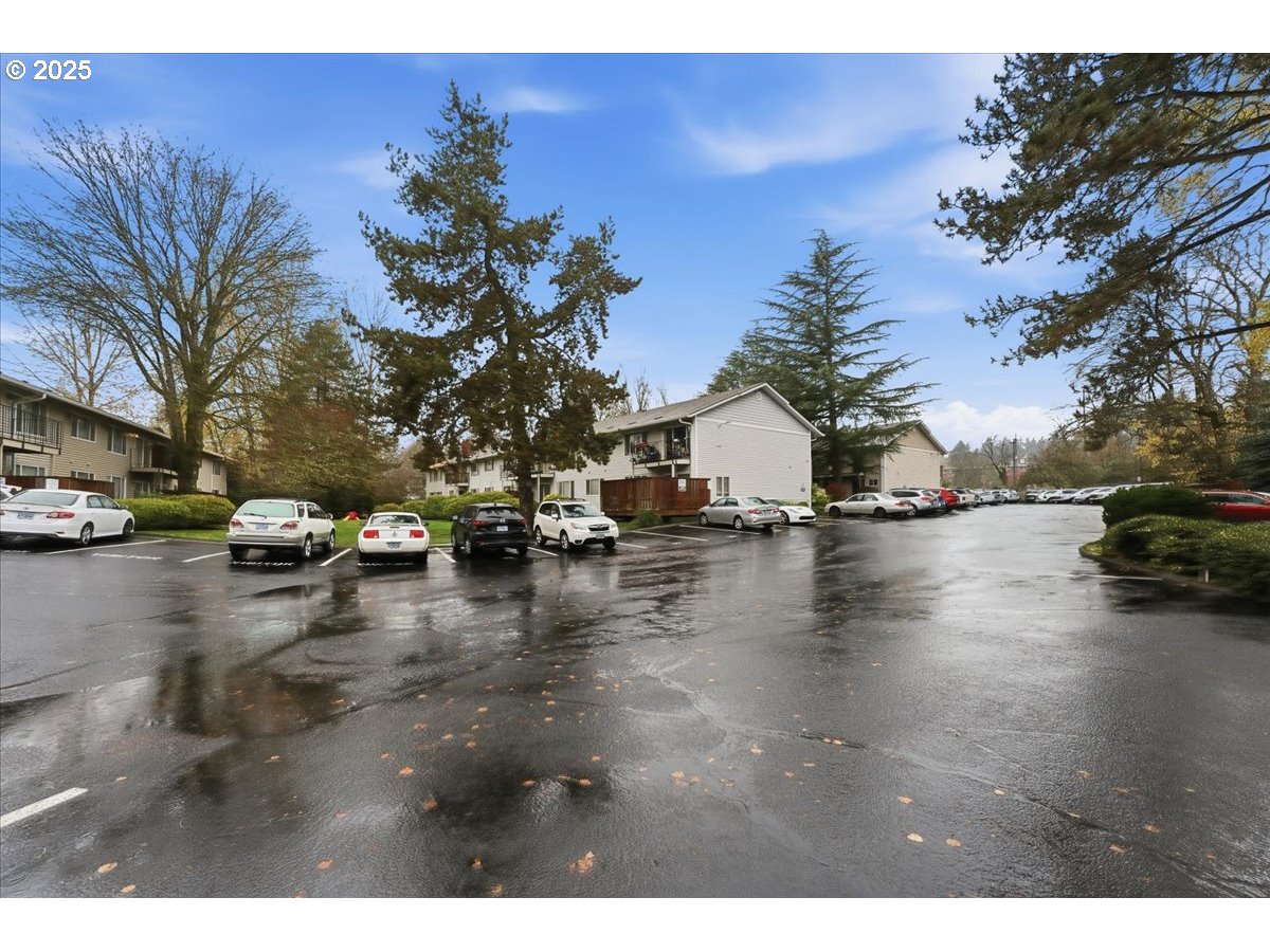 6835 Southwest Capitol Hill Road, Unit 30 Portland, OR 97219 - Photo 9 of 33 a view of a street with cars