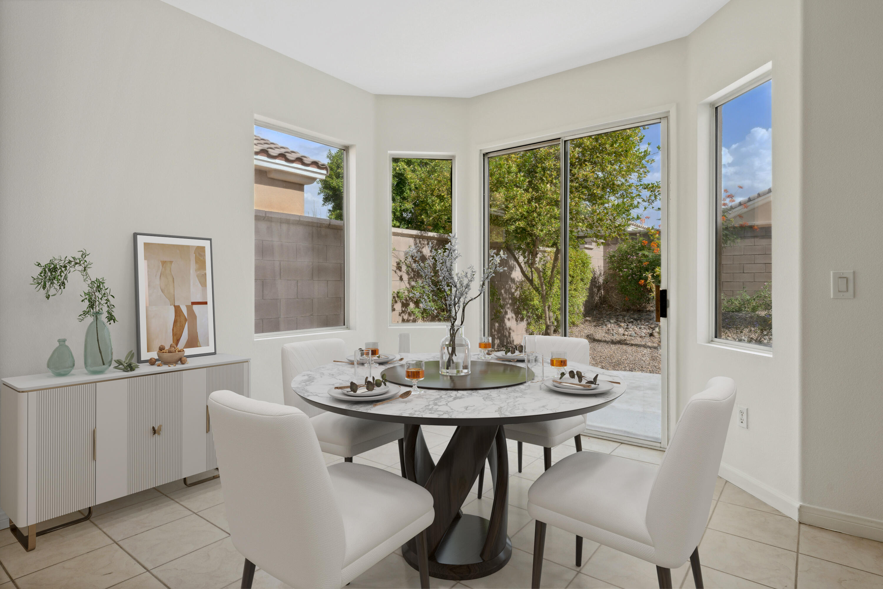 78640 Rainswept Way Palm Desert, CA 92211 - Photo 22 of 37 a dining room with furniture and window