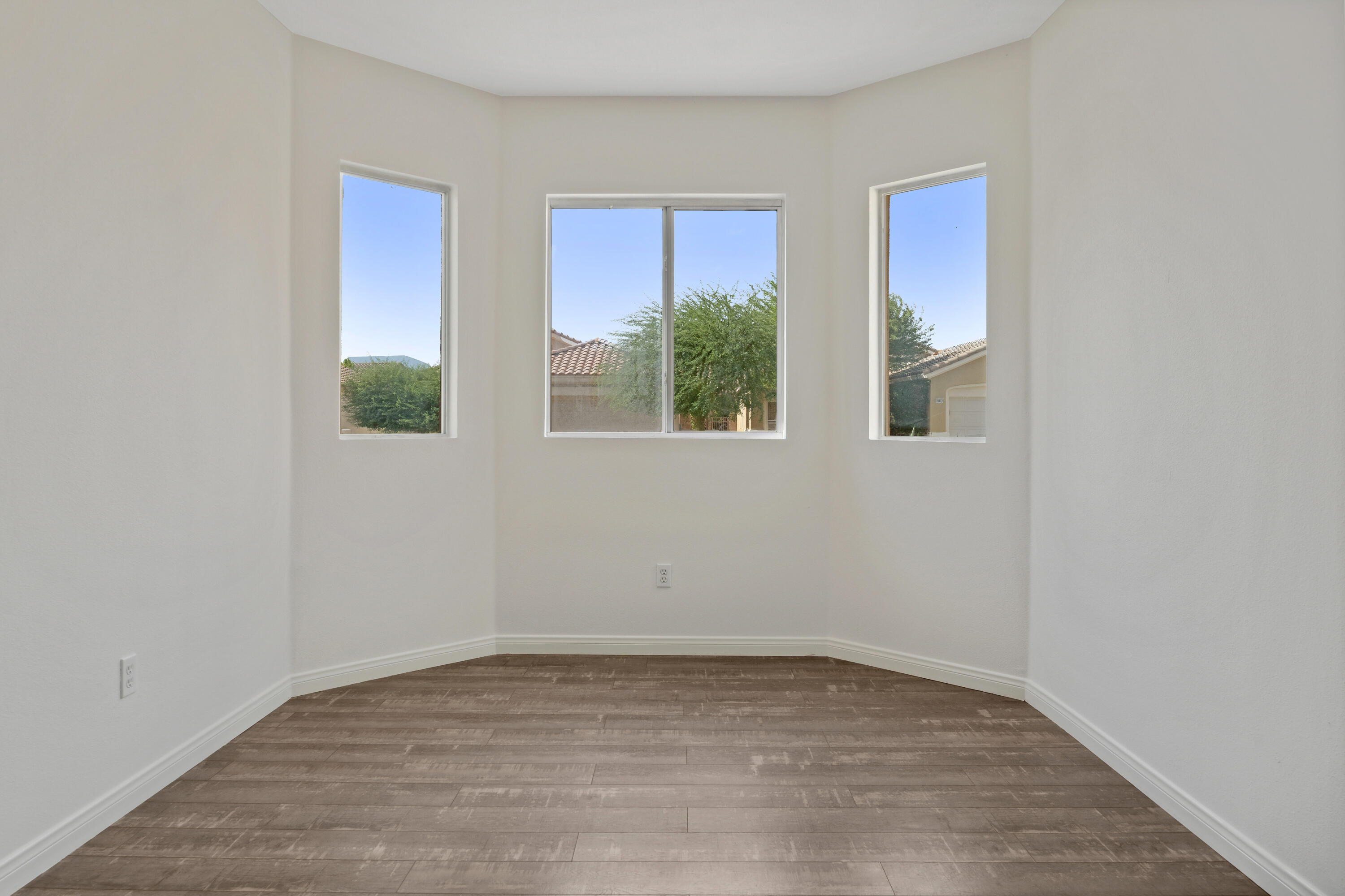 78640 Rainswept Way Palm Desert, CA 92211 - Photo 28 of 37 an empty room with windows