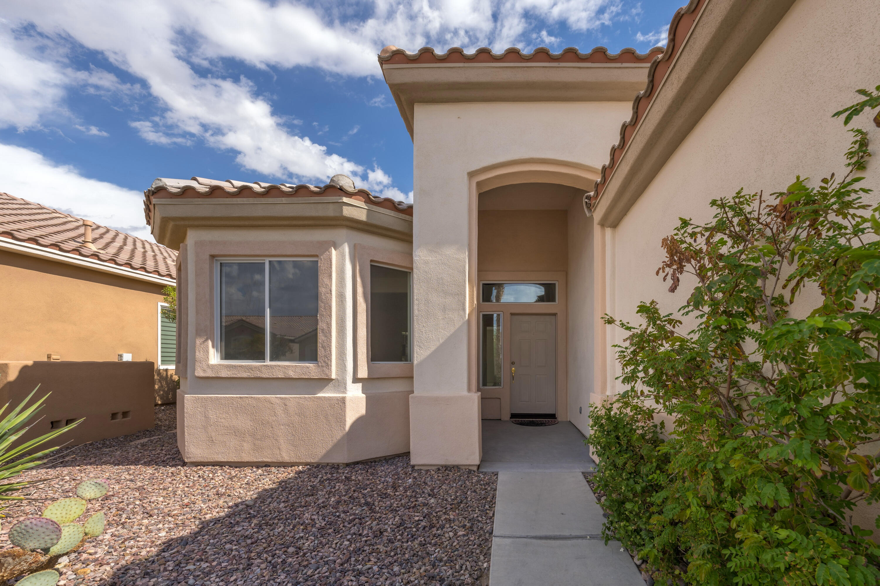 78640 Rainswept Way Palm Desert, CA 92211 - Photo 6 of 37 a view of entrance door of the house