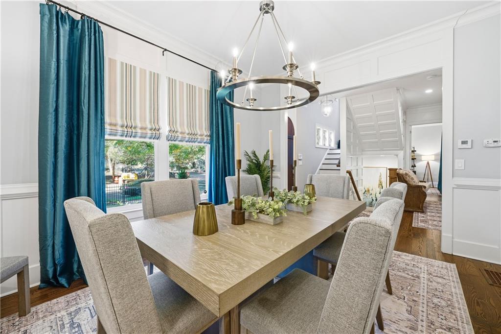 1295 Cumberland Road Northeast Atlanta, GA 30306 - Photo 12 of 71 a view of a dining room with furniture window and outside view