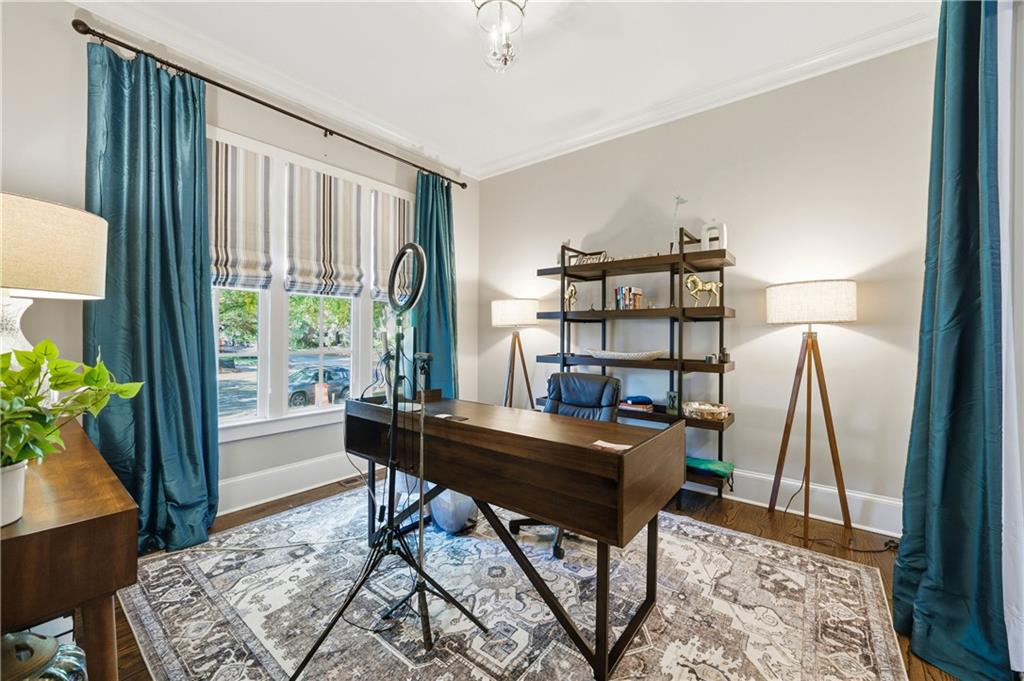 1295 Cumberland Road Northeast Atlanta, GA 30306 - Photo 17 of 71 a view of a workspace with furniture and a window