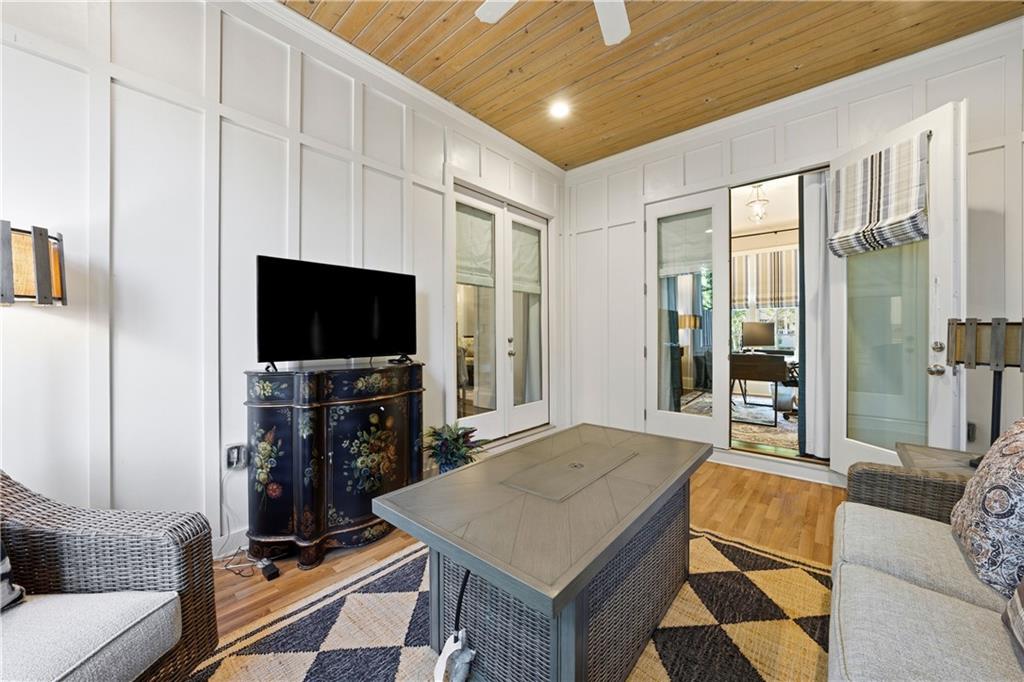 1295 Cumberland Road Northeast Atlanta, GA 30306 - Photo 20 of 71 a living room with furniture and a flat screen tv