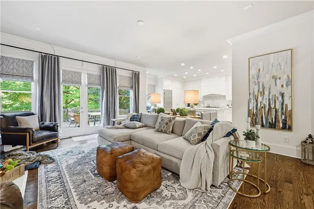 a bathroom with a toilet a sink and shower