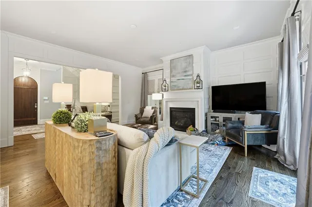 a view of living room with furniture and flat screen tv