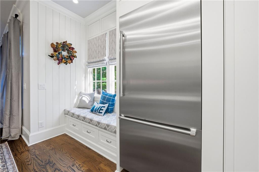 1295 Cumberland Road Northeast Atlanta, GA 30306 - Photo 37 of 71 a living room with furniture and a potted plant