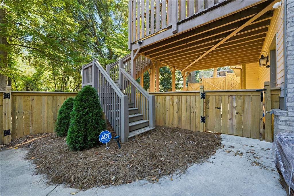 1295 Cumberland Road Northeast Atlanta, GA 30306 - Photo 63 of 71 a view of a house with a backyard