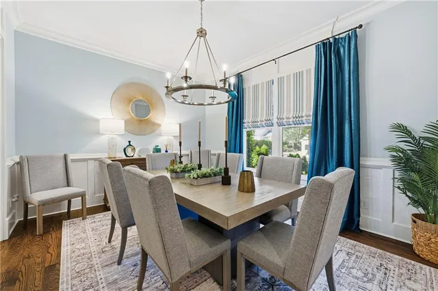 a view of a livingroom with furniture and staircase