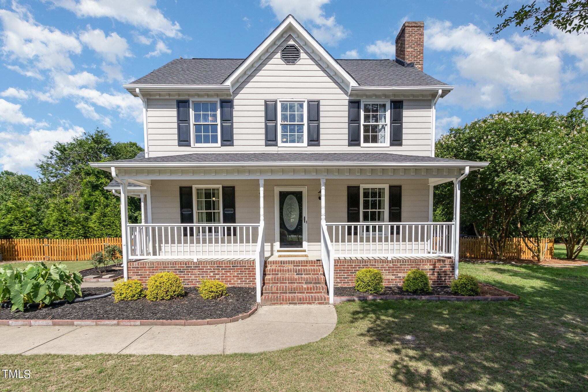 6004 Swales Way Raleigh, NC 27603 - Photo 1 of 24 a front view of a house with a yard