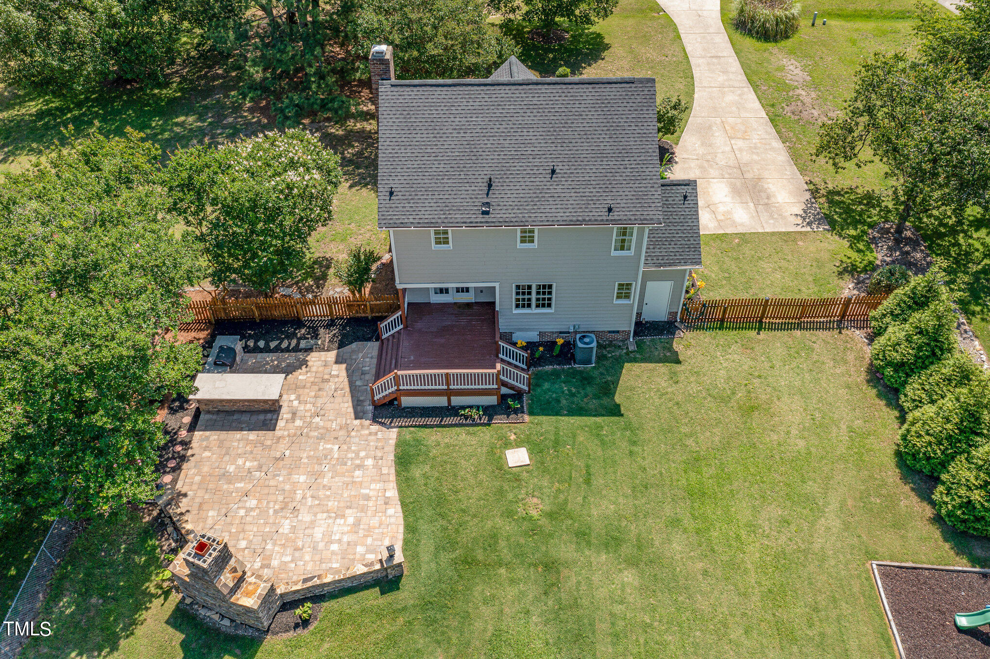 6004 Swales Way Raleigh, NC 27603 - Photo 18 of 24 a aerial view of a house with swimming pool and a yard