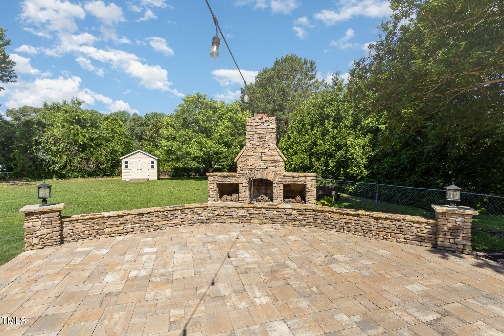 6004 Swales Way Raleigh, NC 27603 - Photo 21 of 24 a view of house with yard outdoor seating and entertaining space