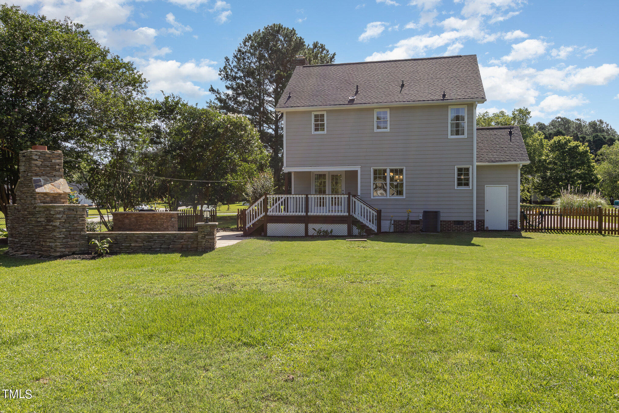 6004 Swales Way Raleigh, NC 27603 - Photo 23 of 24 a view of a house with a back yard