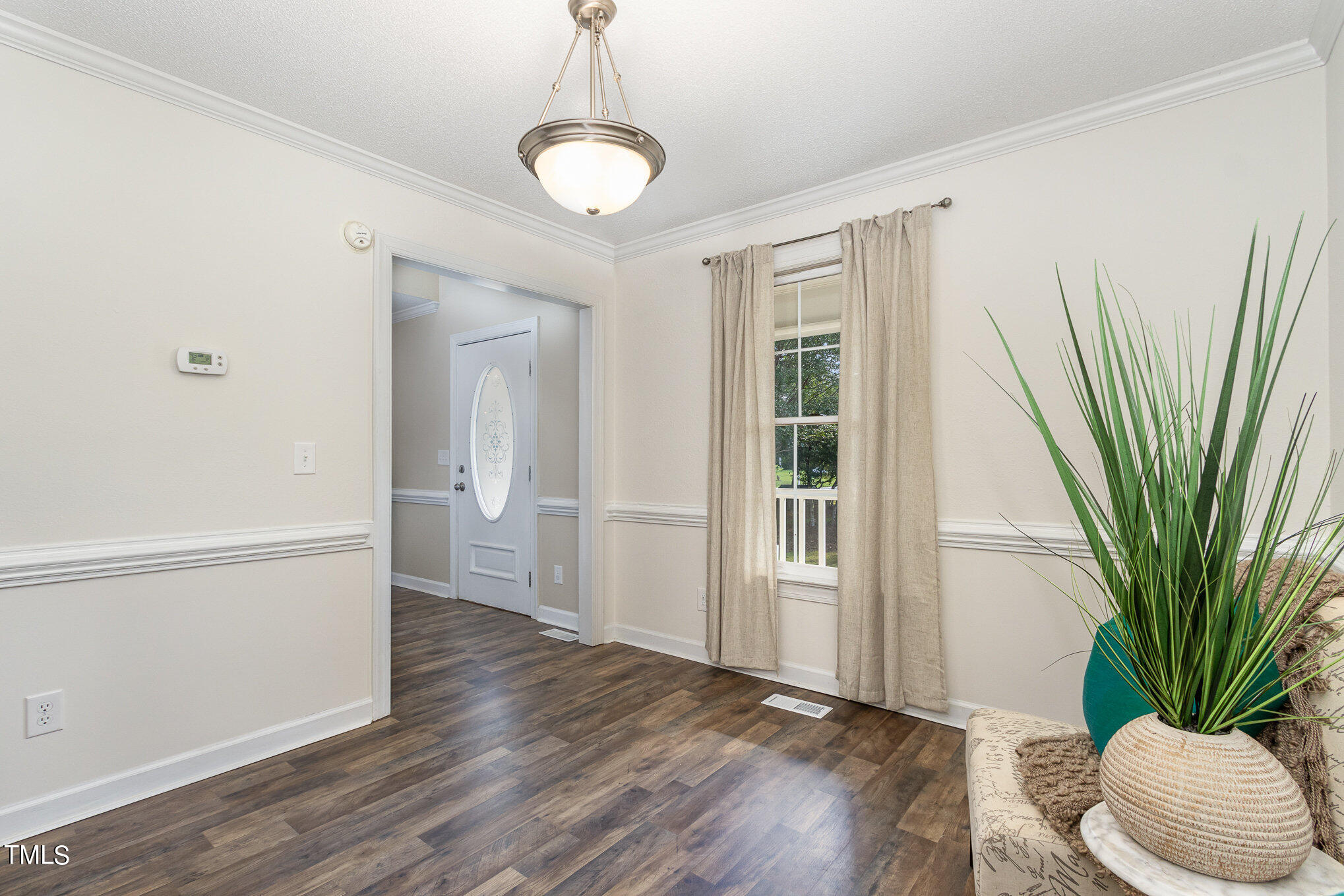 6004 Swales Way Raleigh, NC 27603 - Photo 10 of 24 a view of livingroom with furniture and wooden floor