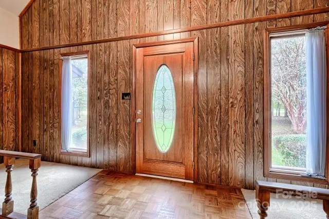 a view of entry way with wooden floor