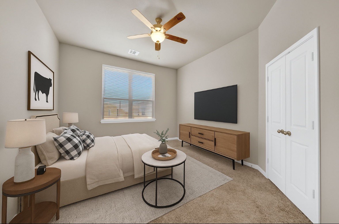 4791 Native Tree Lane Bryan, TX 77845 - Photo 11 of 22 a living room with furniture a flat screen tv and a window