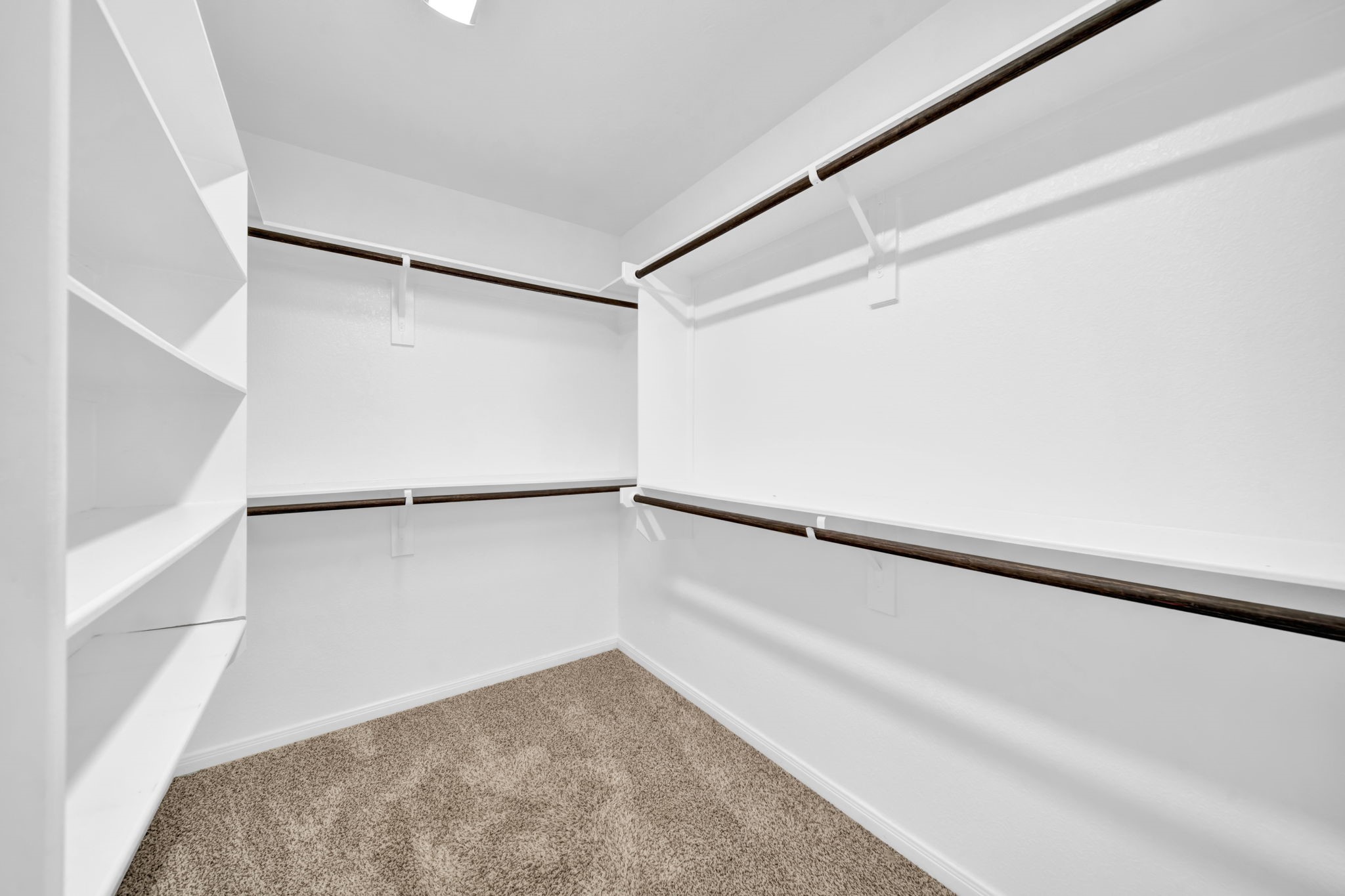 4791 Native Tree Lane Bryan, TX 77845 - Photo 12 of 22 a view of an empty walk in closet
