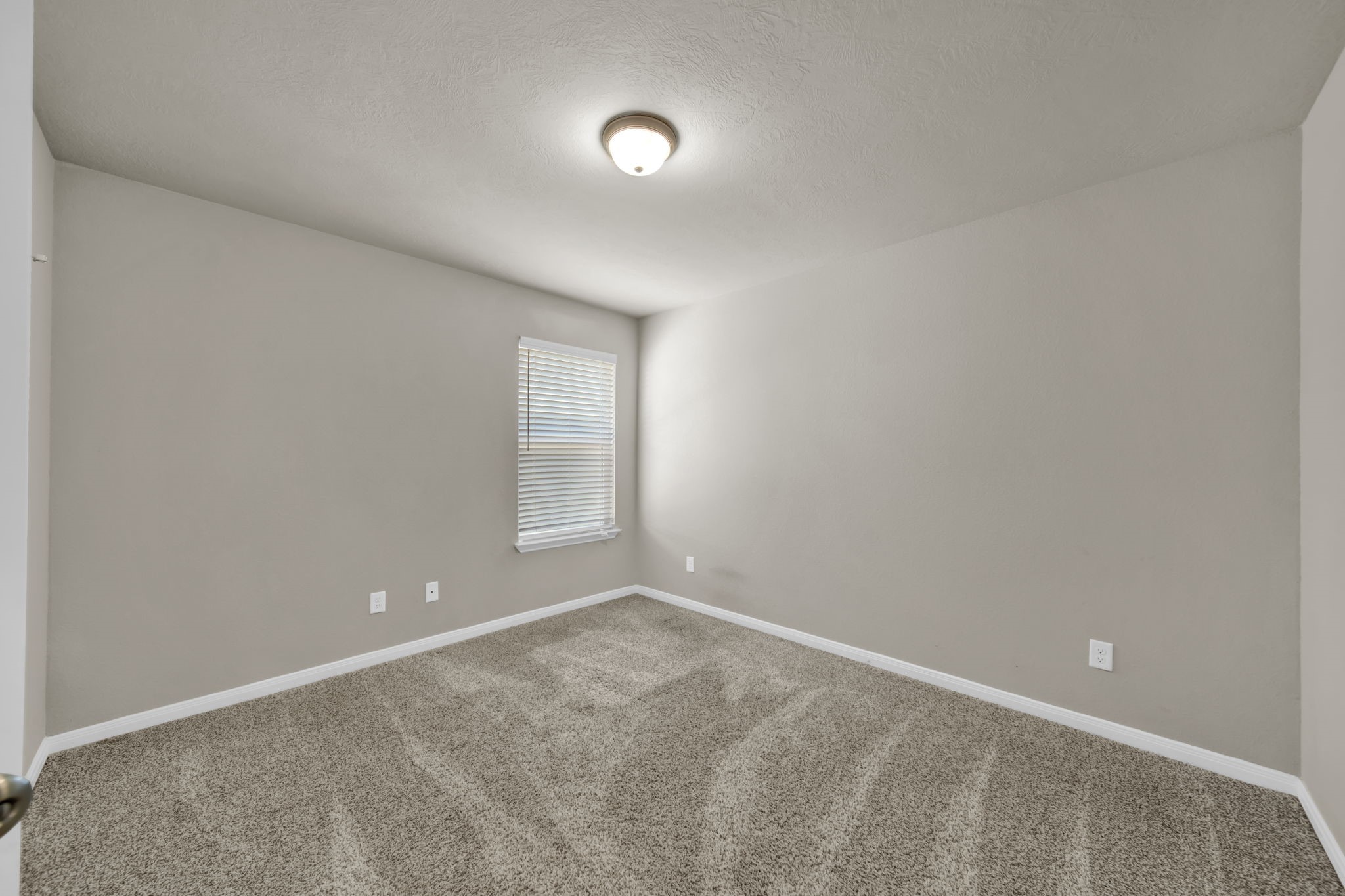 4791 Native Tree Lane Bryan, TX 77845 - Photo 14 of 22 a view of an empty room with a window