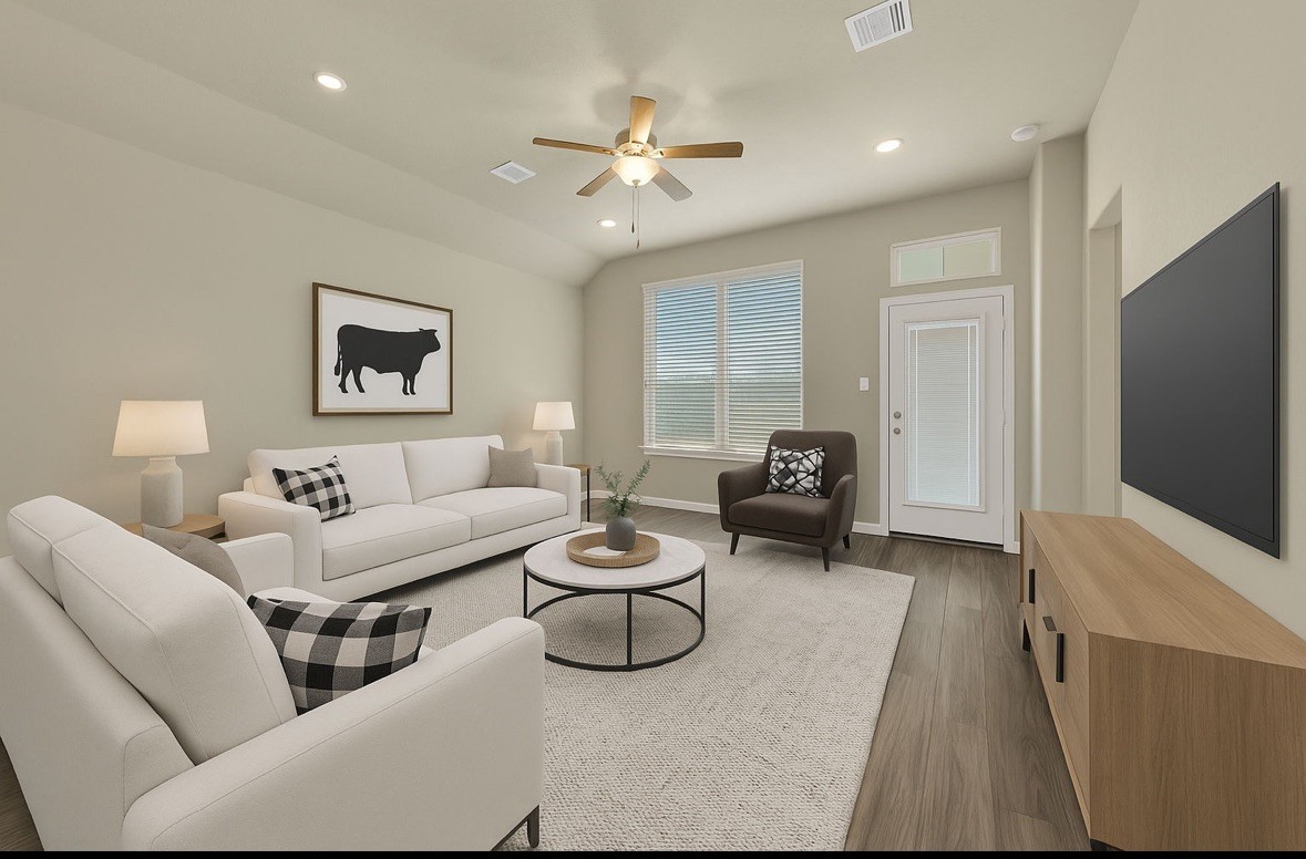 4791 Native Tree Lane Bryan, TX 77845 - Photo 9 of 22 a living room with furniture and a flat screen tv