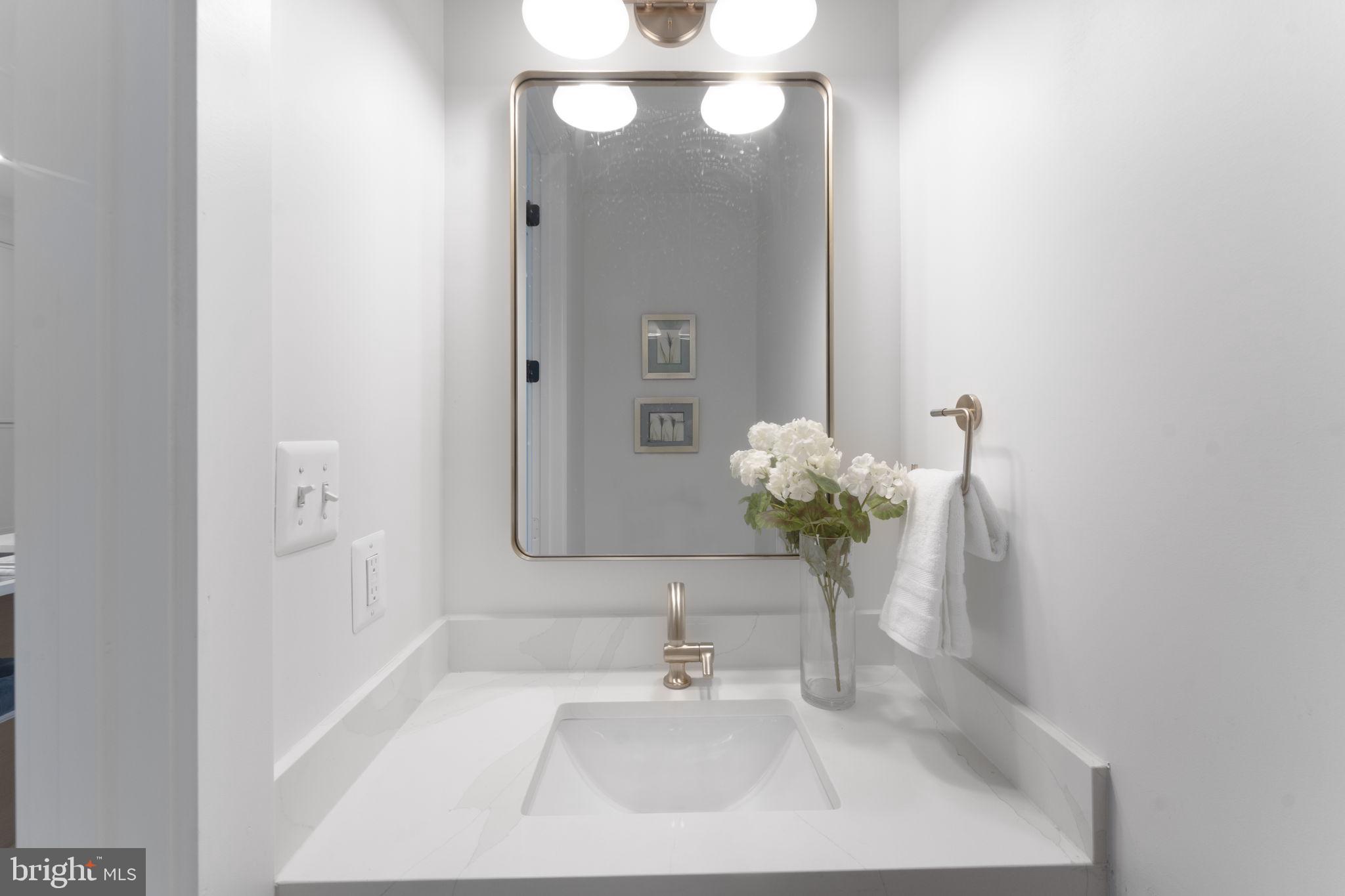 602 U Street Northwest Washington, DC 20001 - Photo 10 of 39 a bathroom with a sink and a mirror