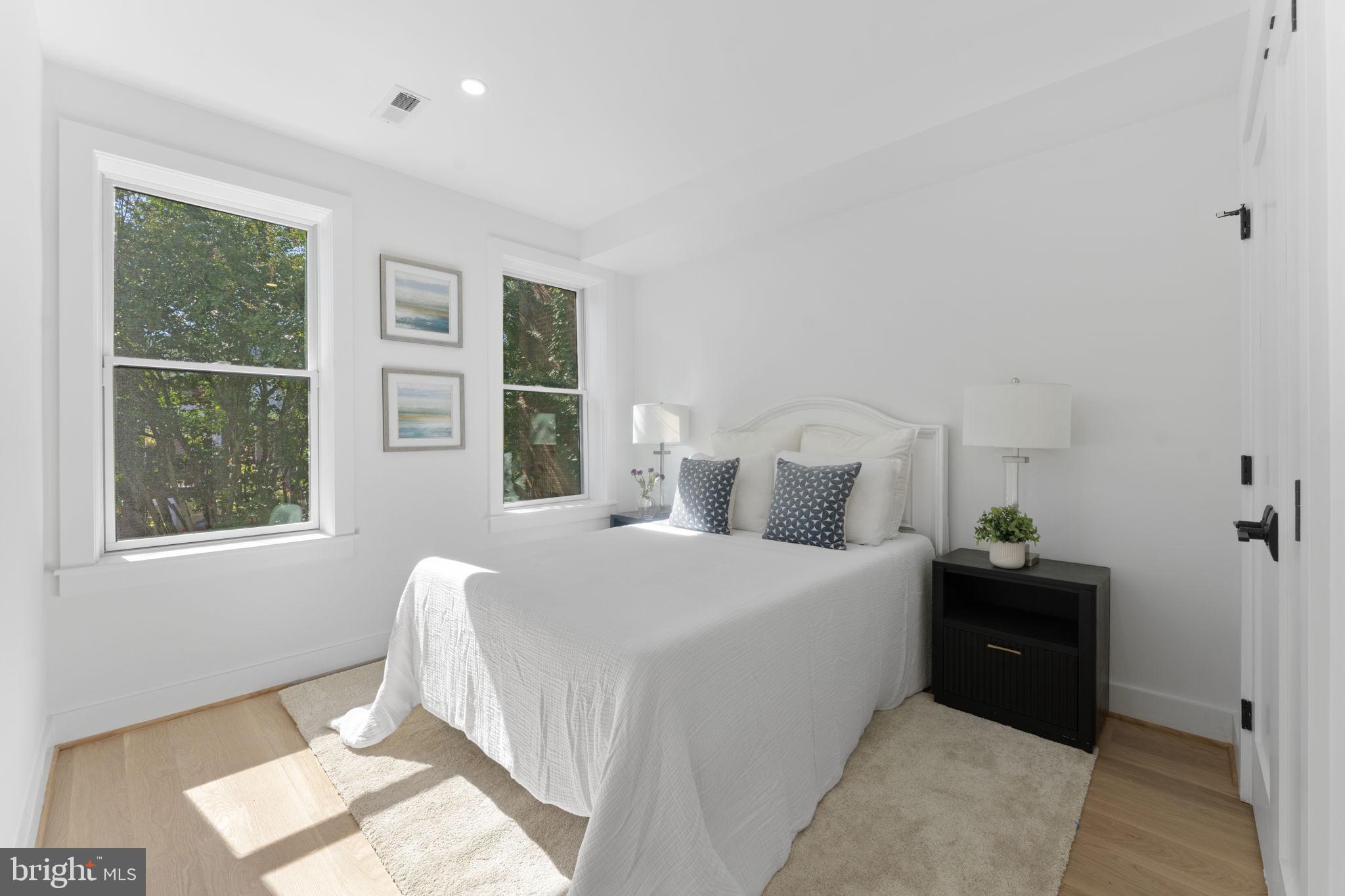 602 U Street Northwest Washington, DC 20001 - Photo 15 of 39 a bedroom with a bed and a window