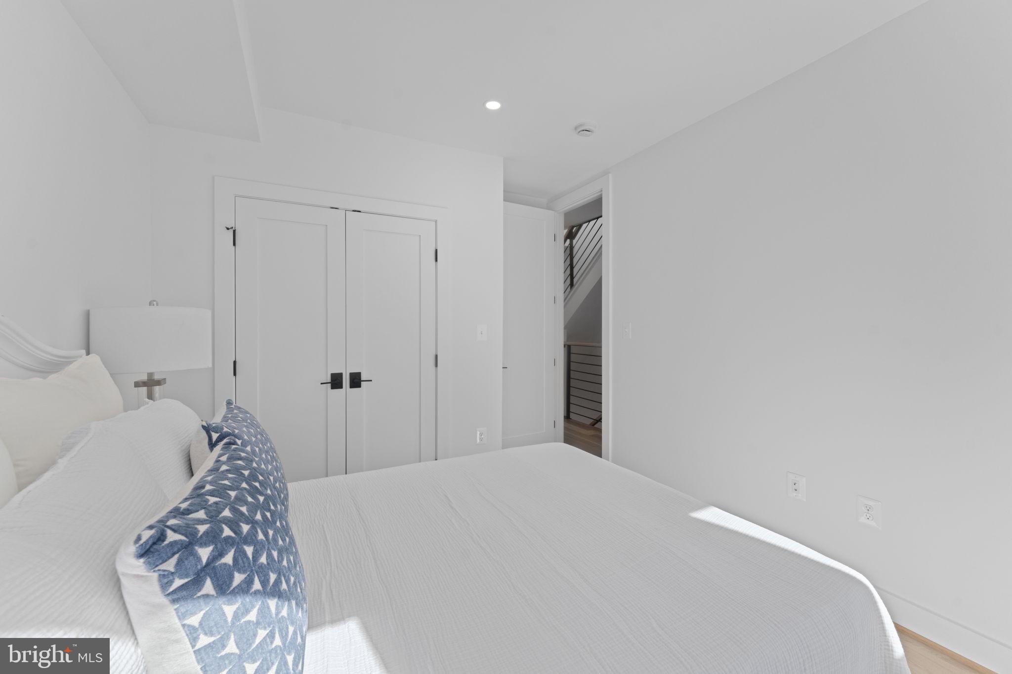 602 U Street Northwest Washington, DC 20001 - Photo 16 of 39 a bedroom with a bed and a cabinets