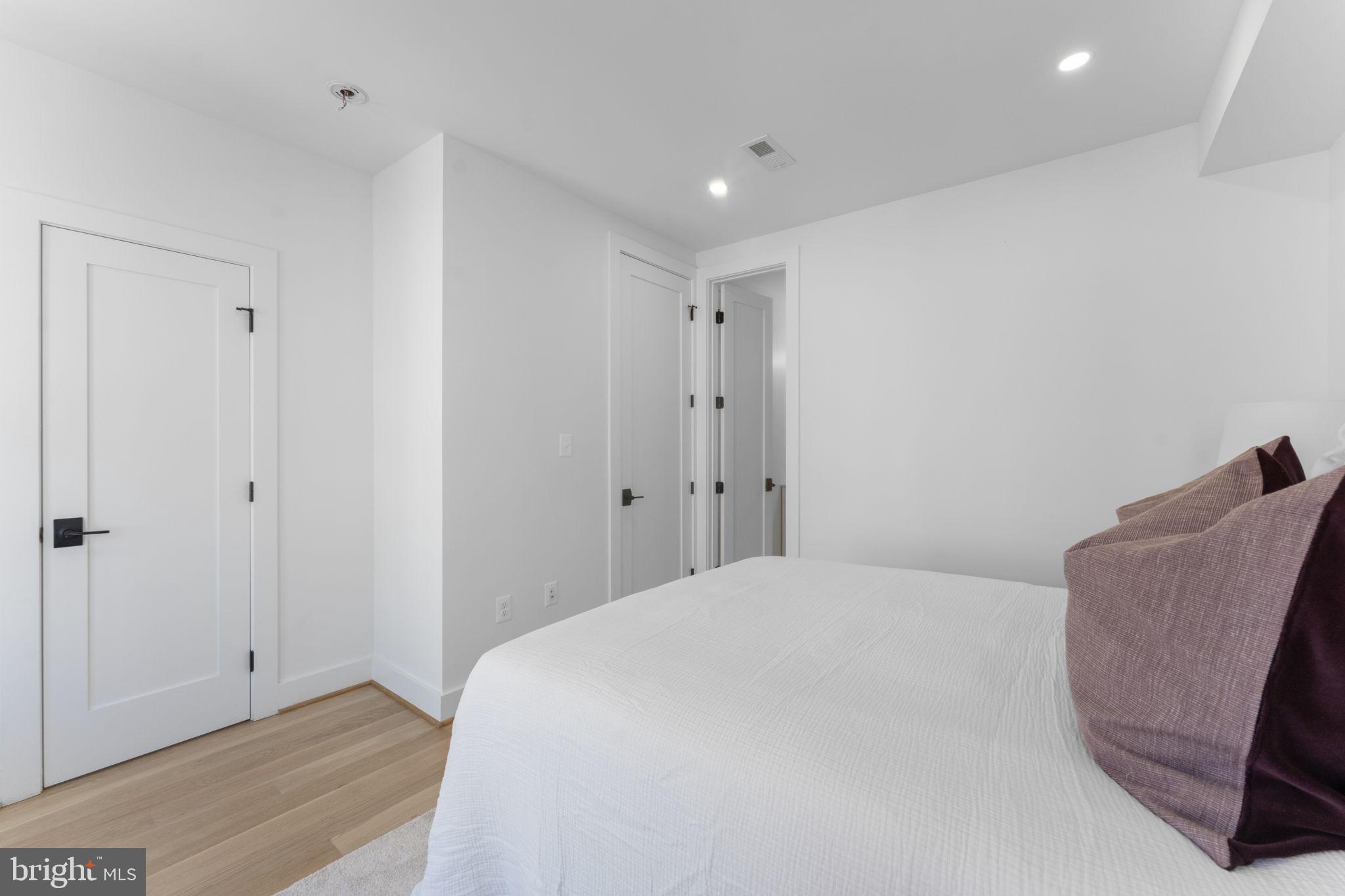 602 U Street Northwest Washington, DC 20001 - Photo 22 of 39 a bedroom with a bed and a chair