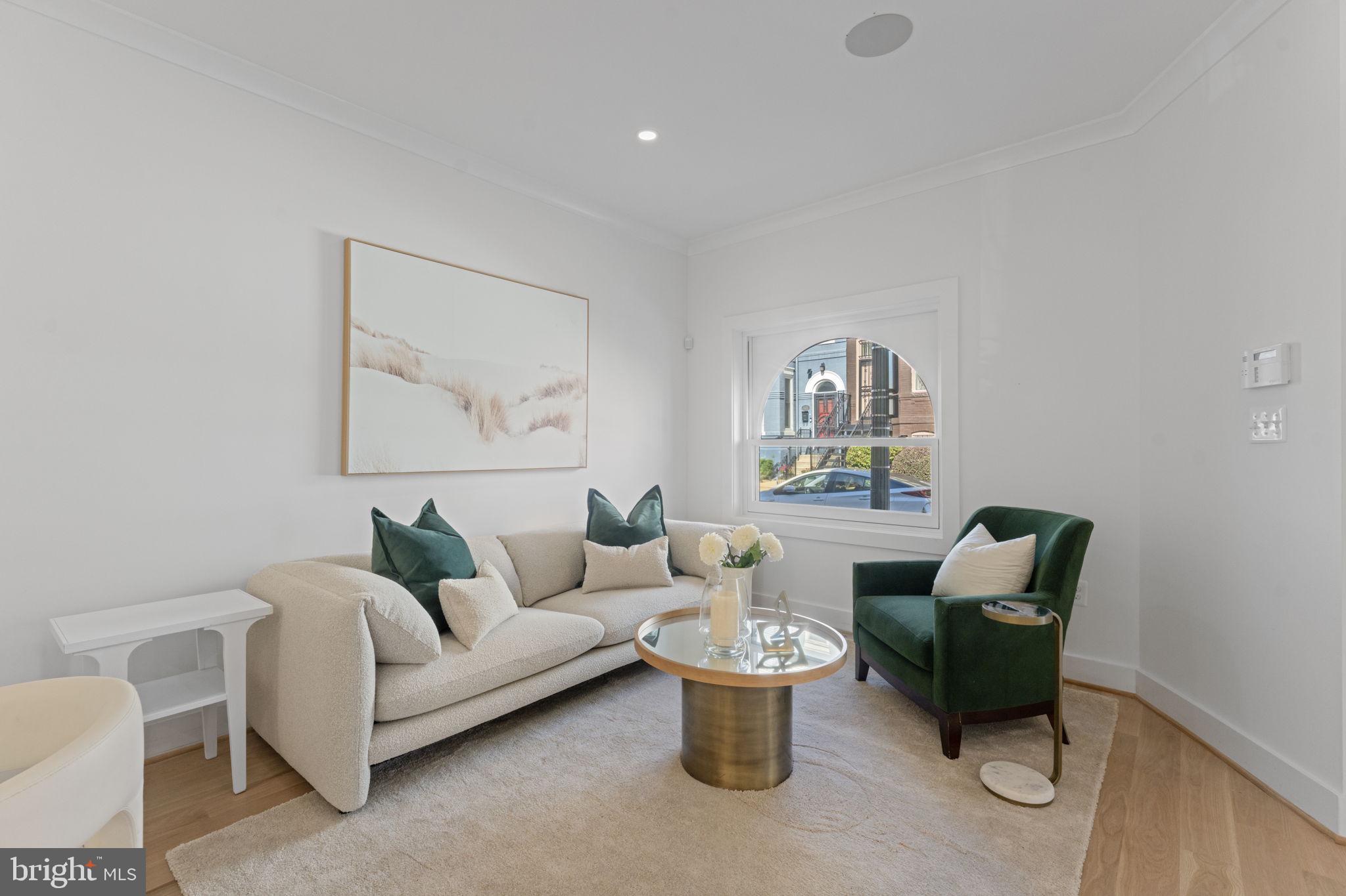 602 U Street Northwest Washington, DC 20001 - Photo 4 of 39 a living room with furniture and a potted plant