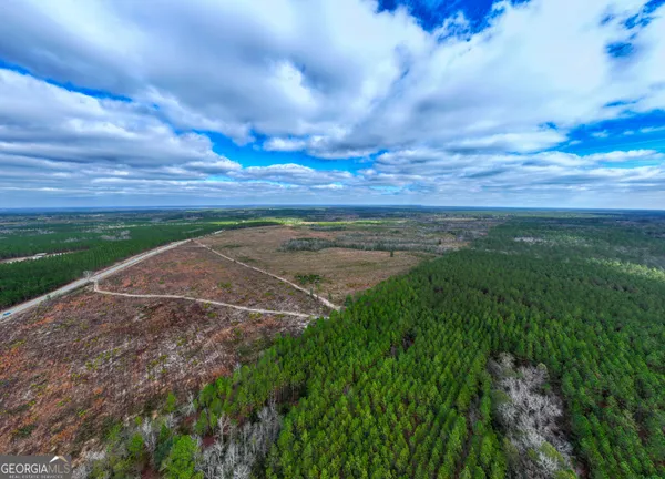 a view of a field with beach