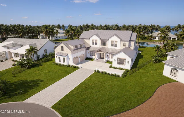 a bedroom with a bed a couch and dresser