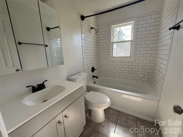 a view of a backyard of a house