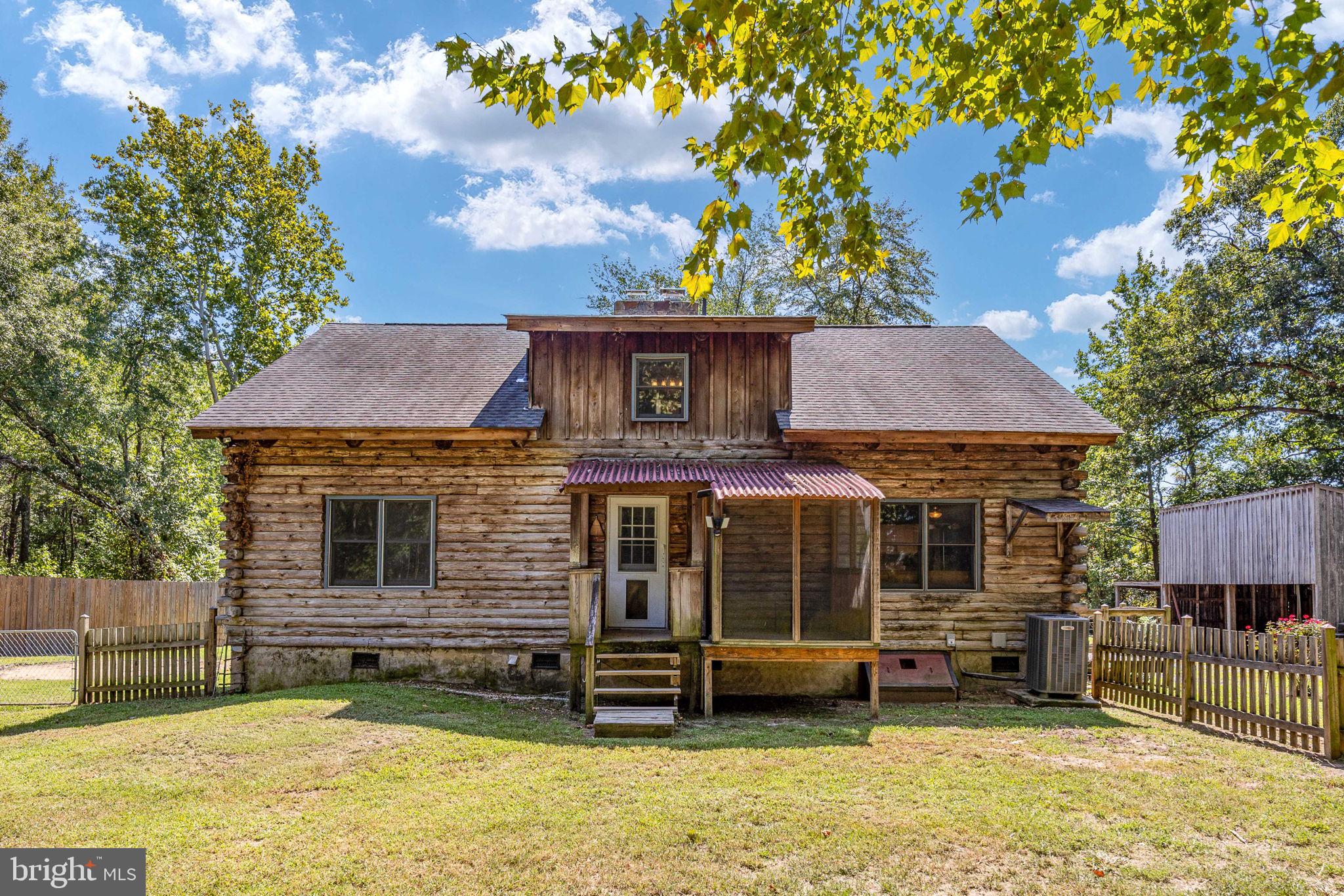 478 Truslow Road Fredericksburg, VA 22405 - Photo 64 of 87 Back of Log home with screened deck