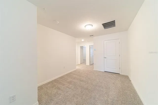 an empty room with an entryway