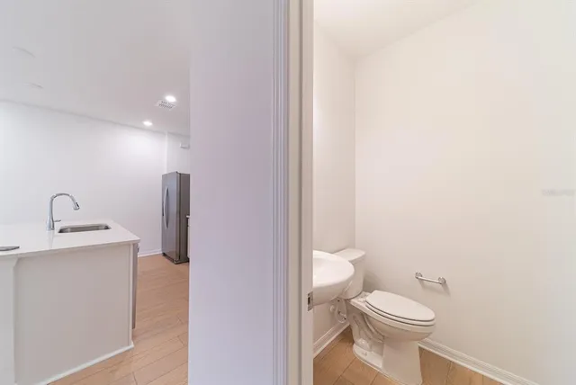 a bathroom with a toilet and a sink