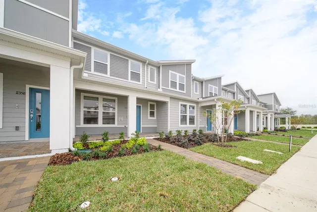 a view of swimming pool with outdoor seating
